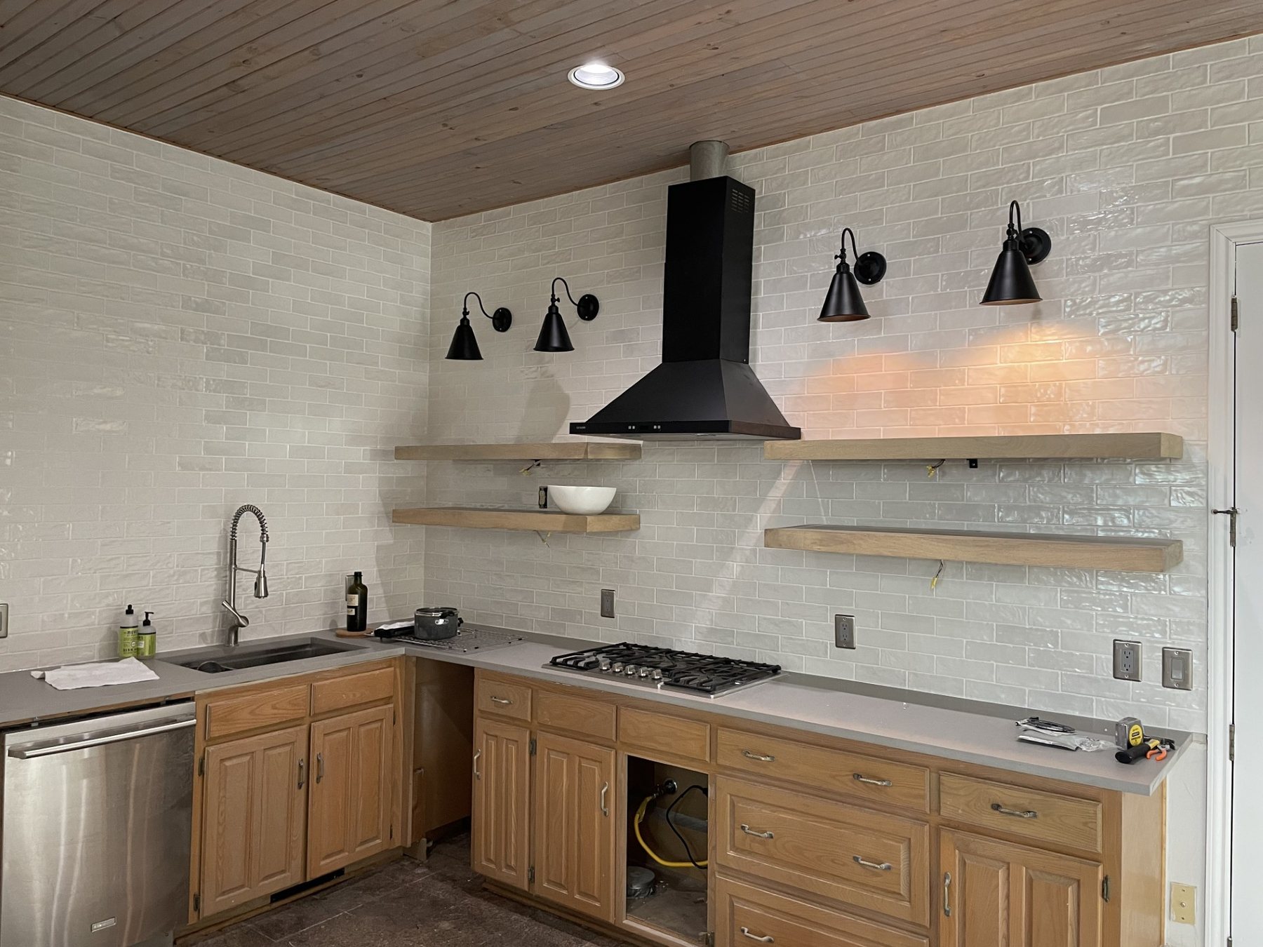 Full-Height Kitchen Tile Wall, Floating Shelves & Vent Hood