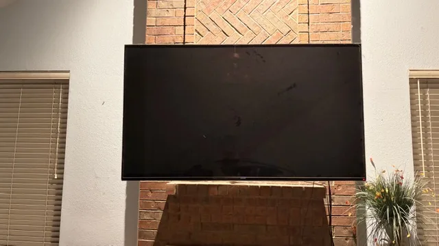 Television mounted over a fireplace.